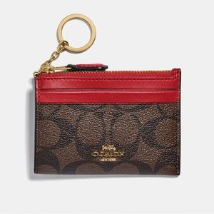 Coach Mini Skinny Id Case In Signature Canvas